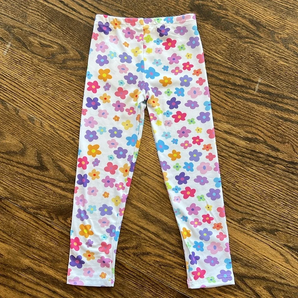 Social Butterfly white leggings with rainbow hearts toddler girl